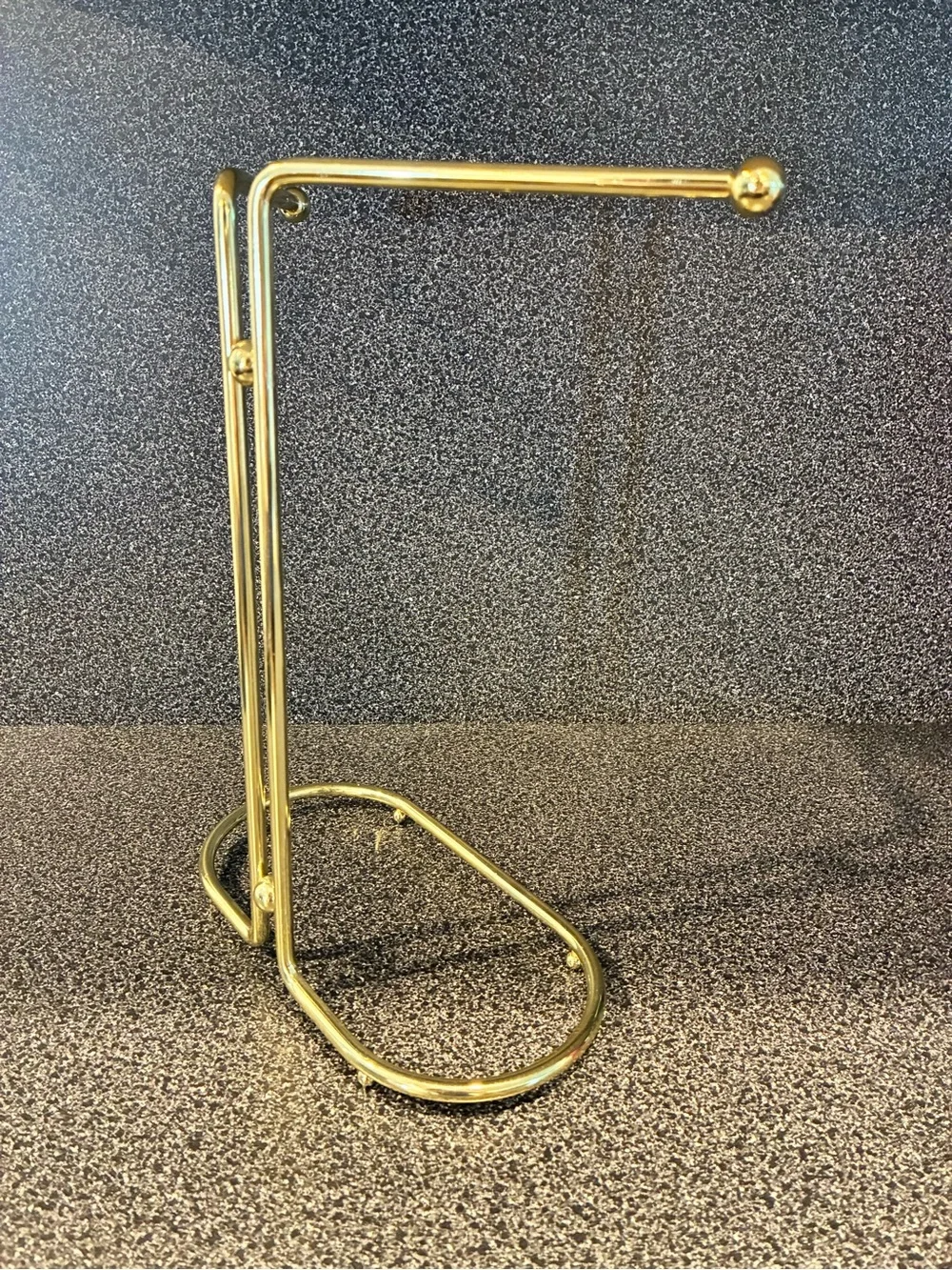 Vintage gold-tone metal countertop vanity hand towel stand